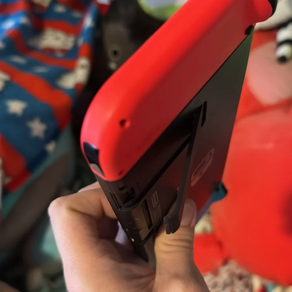 Nintendo switch handheld gaming system like brand new barley ever used